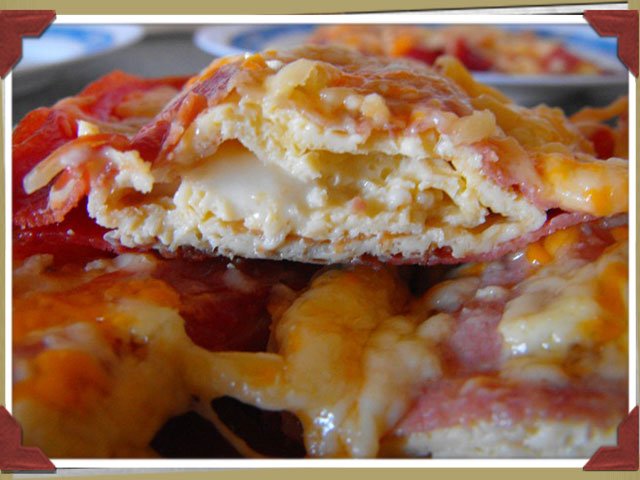 Rollitos de tortilla rellenos y gratinados