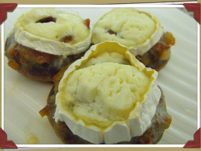 Champiñones rellenos al vino