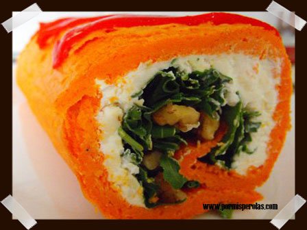 Rollo de piquillo, queso, rúcula y nueces