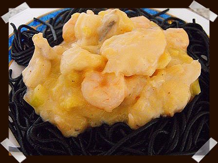 Spaguetti nero di sepia con rape y gambas